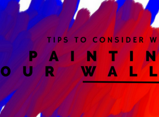 Painting a wall - Viya Constructions